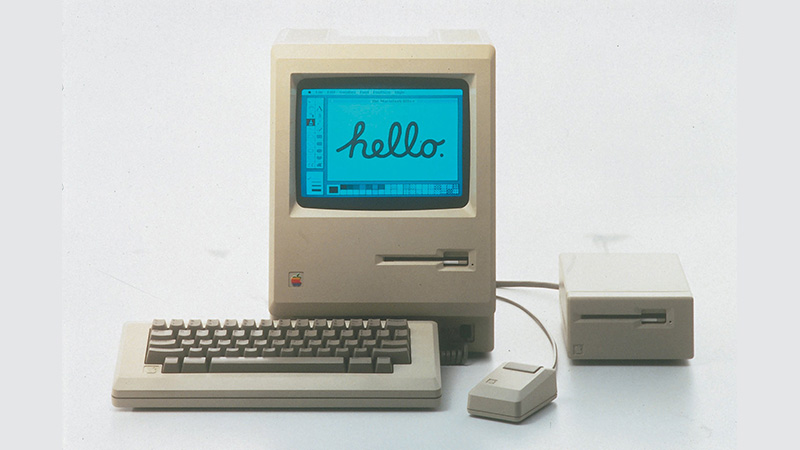 A Macintosh 128 with keyboard, mouse, and external floppy diskette drive.