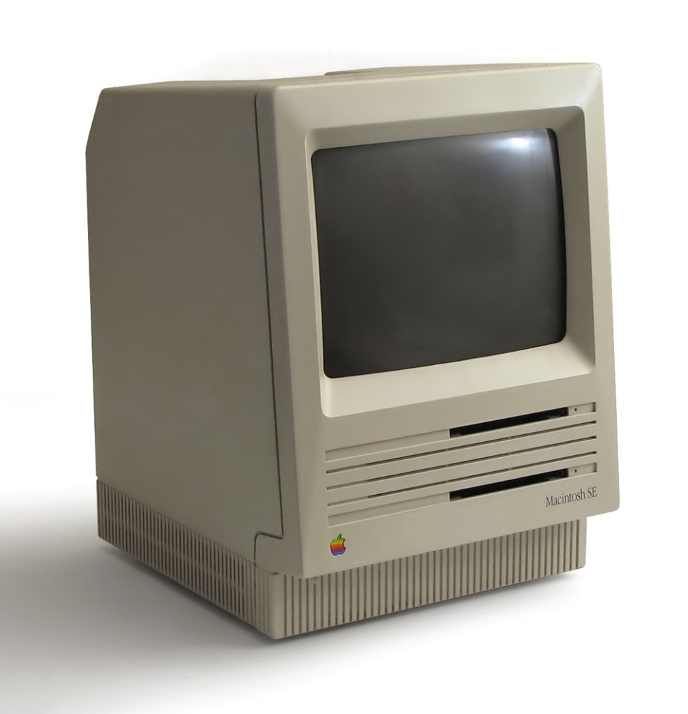 A Macintosh SE two-floppy diskette model.