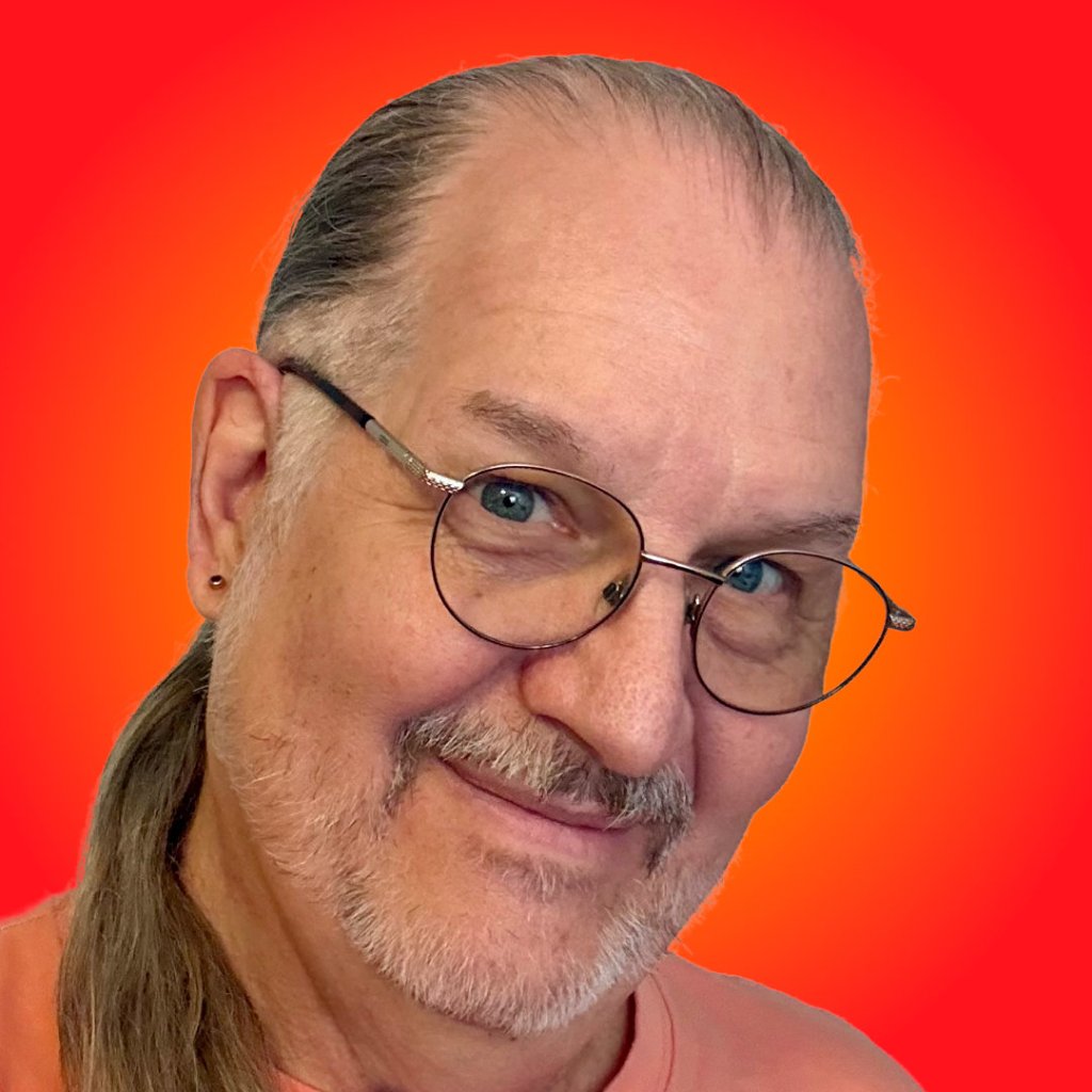 Smirking portrait of Barry “Bazza” Midgorden on a bright red-orange background